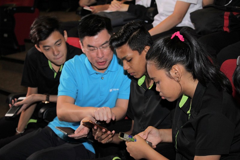 A Microsoft instructor shows ITE College West students how to build apps through Touch Develop, an interactive programming environment developed by Microsoft Research